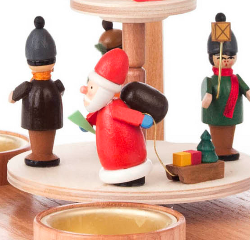 Authentic German Pyramids ON SALE! | Features handcarved Santa with 3 children holding lanterns on the lower turntable, 2 riders on rocking horses on the upper turntable, intricate trees throughout, and 4 premium brass tealight candle holders. USE: Place the candle in the designated holders on the pyramid. Heat from the candle will slowly cause the blades to rotate. | 2-Tier Santa with Lantern Children and Rocking Horses, 9" 085/P/528/D | Handmade in the Erzgebirge region of Seiffen, Germany | Lindenhaus Imports in Helen, Ga Authentic German Pyramids ON SALE! | Features handcarved Santa with 3 children holding lanterns on the lower turntable, 2 riders on rocking horses on the upper turntable, intricate trees throughout, and 4 premium brass tealight candle holders. USE: Place the candle in the designated holders on the pyramid. Heat from the candle will slowly cause the blades to rotate. | 2-Tier Santa with Lantern Children and Rocking Horses, 9" 085/P/528/D | Handmade in the Erzgebirge region of Seiffen, Germany | Lindenhaus Imports in Helen, Ga