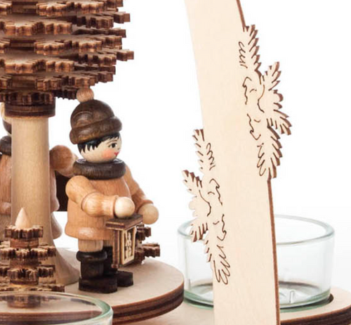 Authentic German Pyramids ON SALE! | Features 3 handcarved children in winter clothes holding lanterns on the lower turntable, intricate rotating tree in center, and 4 premium glass tealight candle holders. USE: Place the candle in the designated holders on the pyramid. Heat from the candle will slowly cause the blades to rotate. | 1-Tier Laternenkindern (Lantern Children), 10" 085/P/663/D | Handmade in the Erzgebirge region of Seiffen, Germany | Lindenhaus Imports in Helen, Ga Authentic German Pyramids ON SALE! | Features 3 handcarved children in winter clothes holding lanterns on the lower turntable, intricate rotating tree in center, and 4 premium glass tealight candle holders. USE: Place the candle in the designated holders on the pyramid. Heat from the candle will slowly cause the blades to rotate. | 1-Tier Laternenkindern (Lantern Children), 10" 085/P/663/D | Handmade in the Erzgebirge region of Seiffen, Germany | Lindenhaus Imports in Helen, Ga