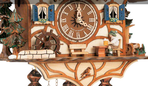 This exquisite clock features intricately carved details, showcasing a whimsical scene of a beer drinker cheerfully raising his stein, surrounded by the natural beauty of the Black Forest.