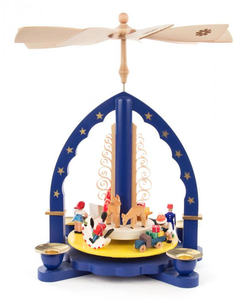 Authentic German Pyramids ON SALE! | Features Santa with sled and presents, woman with bassinet, full train set, 2 deer, 1 nutcracker on rocking horse, man with truck full of presents, handcrafted candles and handcarved curved wooden accents on middle rotator with 4 brass candle holders To use, place the candle in the designated holders on the pyramid. Heat from the candle will slowly cause the blades to rotate. | 1-Tier Santa Village Scene, 11" 085/P/01607/D | Handmade in the Erzgebirge region of Seiffen, Germany | Lindenhaus Imports in Helen, Ga Authentic German Pyramids ON SALE! | Features Santa with sled and presents, woman with bassinet, full train set, 2 deer, 1 nutcracker on rocking horse, man with truck full of presents, handcrafted candles and handcarved curved wooden accents on middle rotator with 4 brass candle holders To use, place the candle in the designated holders on the pyramid. Heat from the candle will slowly cause the blades to rotate. | 1-Tier Santa Village Scene, 11" 085/P/01607/D | Handmade in the Erzgebirge region of Seiffen, Germany | Lindenhaus Imports in Helen, Ga