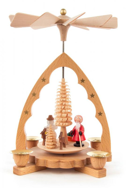 Authentic German Pyramids ON SALE! | handcarved Santa, Snowman, and deer figures on the lower turntable, intricate wooden carvings in the middle, 4 brass candle holders. To use, place the candle in the designated holders on the pyramid. Heat from the candle will slowly cause the blades to rotate. | 1-Tier Santa Snowman, 7" 085/P/16341/D | Handmade in the Erzgebirge region of Seiffen, Germany | Lindenhaus Imports in Helen, Ga