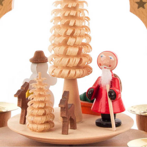 Authentic German Pyramids ON SALE! | handcarved Santa, Snowman, and deer figures on the lower turntable, intricate wooden carvings in the middle, 4 brass candle holders. To use, place the candle in the designated holders on the pyramid. Heat from the candle will slowly cause the blades to rotate. | 1-Tier Santa Snowman, 7" 085/P/16341/D | Handmade in the Erzgebirge region of Seiffen, Germany | Lindenhaus Imports in Helen, Ga Authentic German Pyramids ON SALE! | handcarved Santa, Snowman, and deer figures on the lower turntable, intricate wooden carvings in the middle, 4 brass candle holders. To use, place the candle in the designated holders on the pyramid. Heat from the candle will slowly cause the blades to rotate. | 1-Tier Santa Snowman, 7" 085/P/16341/D | Handmade in the Erzgebirge region of Seiffen, Germany | Lindenhaus Imports in Helen, Ga