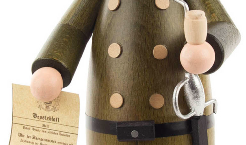 Authentic German Smokers ON SALE | FRONT: This Police Officer He's holding a document titled Gesetzblatt (German for Law Gazette). He is sure to bring joy and fun to your home! | The Polizist (Policeman), 8" 146/S/1773/D | Lindenhaus Imports in Helen, Ga