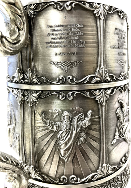 Day 1: "Am Anfang schuf Gott Himmel und Erde. Und er schuf das Licht und die Finsternis und nannte das Licht Tag und die Finsternis Nacht." (Mose 1:1-5) | 'The Lord's Creation' Solid Pewter Stein, 1.75L | Lindenhaus Imports in Helen, Ga Day 1: "Am Anfang schuf Gott Himmel und Erde. Und er schuf das Licht und die Finsternis und nannte das Licht Tag und die Finsternis Nacht." (Mose 1:1-5) | 'The Lord's Creation' Solid Pewter Stein, 1.75L | Lindenhaus Imports in Helen, Ga