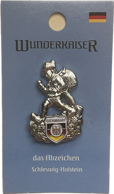 Features a silver, iconic Happy Wanderer hiker with classic Edelweiss flowers along the base, shield on bottom with black, red, and yellow stripes complimented with traditional Eagle crest, "Germany" printed at top of shield, and a metal hat pin clasp on the back || "Germany" Happy Wanderer with Eagle Crest Deluxe Hat Pin HP-D-03 Features a silver, iconic Happy Wanderer hiker with classic Edelweiss flowers along the base, shield on bottom with black, red, and yellow stripes complimented with traditional Eagle crest, "Germany" printed at top of shield, and a metal hat pin clasp on the back || "Germany" Happy Wanderer with Eagle Crest Deluxe Hat Pin HP-D-03