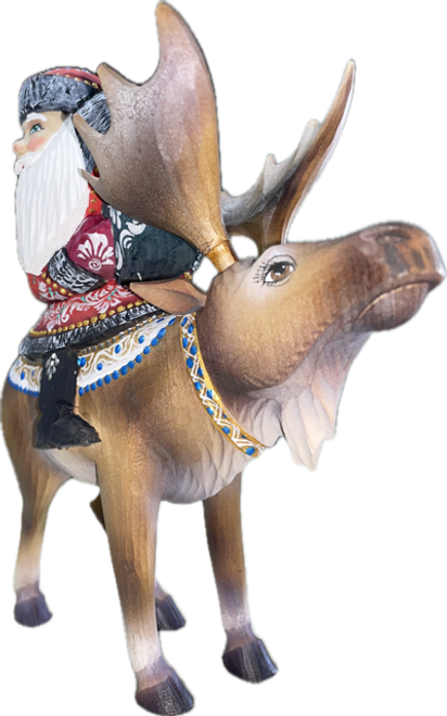 Handcrafted Wooden Christmas Santas ON SALE! | Features an intricately-painted red base coat Santa with an incredible amount of detail work to his toy bag with hand-painted birds and handcarved elk. | 3-Piece Handcarved Wooden Santa on Elk with Birds, 8" | Lindenhaus Imports in Helen, Ga