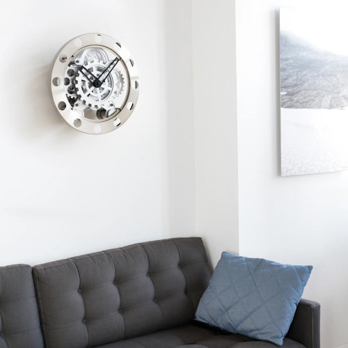 Smooth, sleek, sophisticated, and yet simple! Hang this gear clock in any room or gift it to the engineer, mechanic, or clock lover in your life for his/her shop. The Gear Wall Clock is truly a versatile clock that will captivate guests with its sleek design and rotating movement.