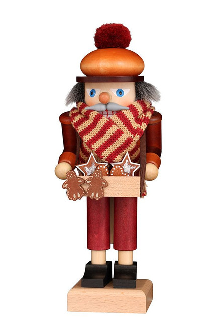 Authentic German Nutcrackers ON SALE! | FRONT: features real rabbit fur, handcrafted red and yellow scarf, tray full of gingerbread goodies, natural wood finish with lever on back to open and close mouth. || The Lebkuchen (Gingerbread) Vendor, 10" 32/N/698/CU || Handmade in the Erzgebirge region of Seiffen, Germany || Lindenhaus Imports in Helen, Ga