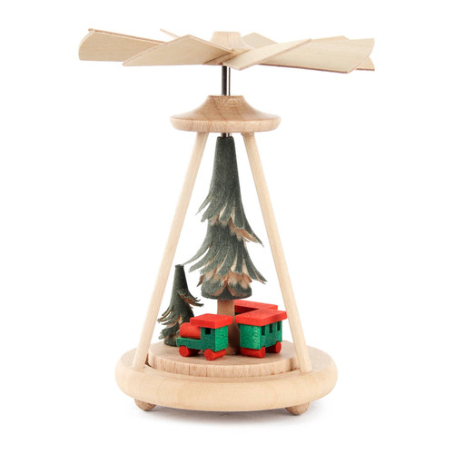 Authentic German Pyramids ON SALE! | Features handcrafted train set, small tree, and incredible craftsmanship detailed in the larger handcarved rotating tree. USE: Warm-Air pyramids do not require candles. Instead, they rely on the temperature difference created by ambient warmth. When the temperature difference between the base and the top is significant enough, the fan begins to spin. As the fan rotates, it sets the entire pyramid in motion. | 1-Tier Mini Train Set, 4" Warm-Air Pyramid 074/P/240/D/1 | Handmade in the Erzgebirge region of Seiffen, Germany | Lindenhaus Imports in Helen, Ga