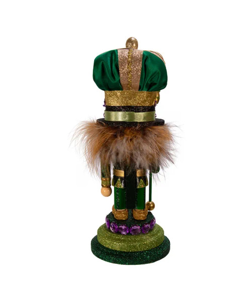 Back view features green, purple, and gold glitter and gem detailing. Back view features green, purple, and gold glitter and gem detailing.