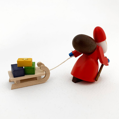 Santa with Sled Wooden German Figurine