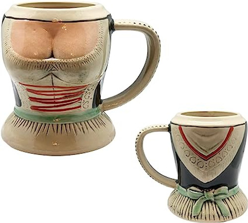 Front and back views of s Traditional Dirndl Beer Mug with Raised Relief made with premium stoneware. Can pour 0.5 liters of beer and is 6-inches tall. Front and back views of s Traditional Dirndl Beer Mug with Raised Relief made with premium stoneware. Can pour 0.5 liters of beer and is 6-inches tall.