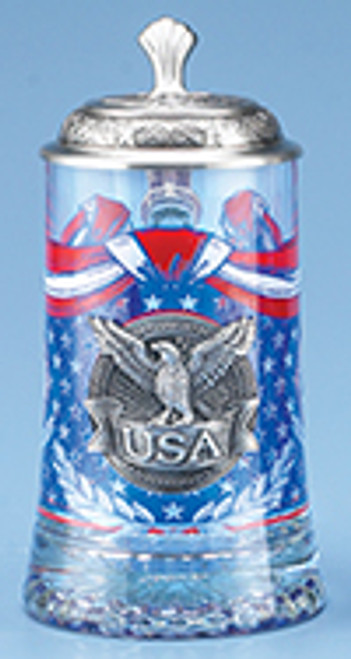 An embossed pewter applique featuring a proud bald eagle perched upon a USA banner is permanently attached to the glass body. || USA Glass Stein #5964 || Lindenhaus Imports in Helen, Ga