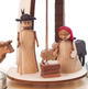 Authentic German Pyramids ON SALE! | Features handcarved Joseph, Mary and Jesus in manger on the lower turntable, wooden farm animals with hand-painted palm tree, and premium glass candle holders. USE: place the candle in the designated holders on the pyramid. Heat from the candle will slowly cause the blades to rotate. | 1-Tier Christi Geburt (Nativity of Christ), 7" 085/P/469/D | Handmade in the Erzgebirge region of Seiffen, Germany | Lindenhaus Imports in Helen, Ga