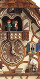 Moving woodchopper, dancers, and cuckoo bird that pops out every hour and half hour