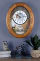 Adorning the dial and background is a tranquil painting of a buck and doe near a lakeside cottage, capturing the essence of an autumn dusk. || Joyful Sunset, 21" RHYTHM Magic Motion Clock 4MH429WU06