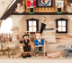 Authentic German Pyramids ON SALE! | Features: 3 handcrafted nutcrackers, 2 woodshop workers, 3D trees and decorative rocking horses throughout, tiny handcarved tools, and LED fairy lights | The Nutcracker Workshop, 11" 202/CA/90544/D/7-110 | Handmade in the Erzgebirge region of Seiffen, Germany | Lindenhaus Imports in Helen, Ga