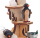 Authentic German Pyramids ON SALE! | Features 5 handcrafted penguins, a silver bucket filled with wooden fish, snowballs throughout, and 3 premium glass candle holders. USE: Place the candle in the designated holders on the pyramid. Heat from the candle will slowly cause the blades to rotate. | 1-Tier Penguins, 7" 085/P/576/D | Handmade in the Erzgebirge region of Seiffen, Germany | Lindenhaus Imports in Helen, Ga