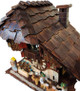 Upper view of authentic Black Forest cuckoo clock handcrafted in Germany! Features hand-carved and hand-laid shingles.