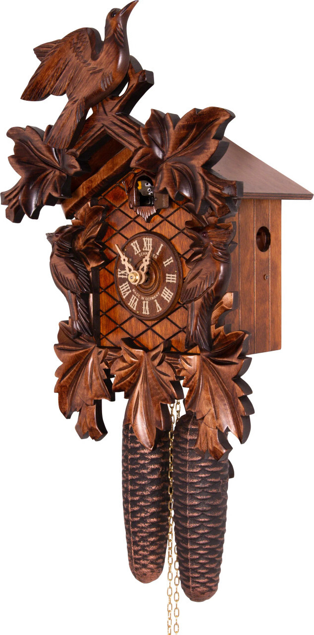 Traditional Black Forest Cuckoo Clock featuring classic 7 leaf/3 bird design with a walnut finish
