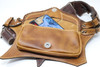 El Milagro Leather Utility Belt Bag with iPhone in it.
