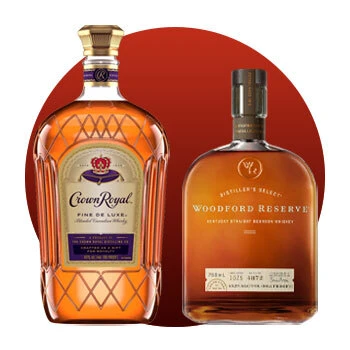 Image of Crown Royal and Woodford Reserved bottles.