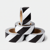 Black/White hazard stripe economy vinyl floor tape 4-pack — four 2 inch by 108 ft rolls, diagonal contrast stripes