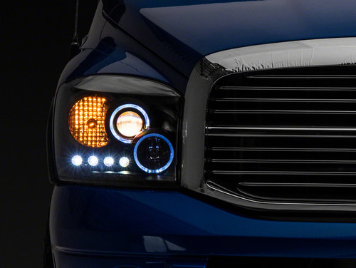 Raxiom 06-08 Dodge RAM 1500 LED Halo Projector Headlights- Blk Housing (Clear Lens) - R110149 Photo - Primary
