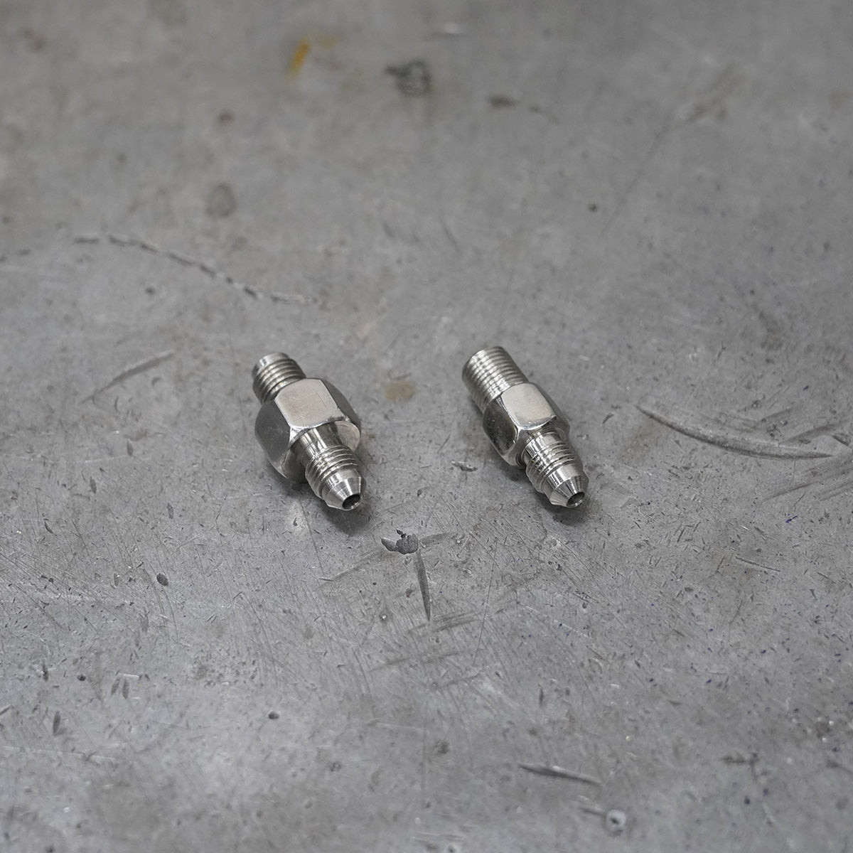 Arlen Ness #325-007 - Polished Stainless Brake Adapter Fittings - 3/8"-24 male IF