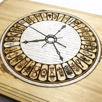 Detail of clock engraving on custom MacBook cover.
