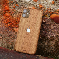 Toast iPhone 11  wood cover in walnut, lifestyle.