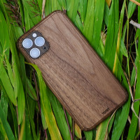 Toast iPhone 11  Pro wood cover in walnut, lifestyle.