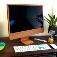 iMac 24 inch with a lyptus wood Toast cover.