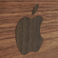 iMac 24" with wooden walnut body and ebony Apple inlay.