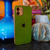 Toast leather and wood combo wrap is the best case for iPhone 14, mini, 14 Pro, and 14 Pro Max.   Pictures in Mojito green with zebrawood side wraps.