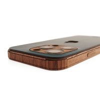Detail of Toast's one-piece leather and wood combo cover for iPhone 15 Pro.