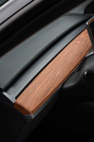 Tesla Model Y with real rosewood covering the dash
