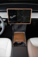 Tesla Model Y real wood wenge covering the dash, center console and screen surround