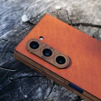 Capture life’s adventures: The Samsung Galaxy TriFold in our whiskey leather and wood combo fits perfectly into any lifestyle