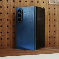 Navy grog leather cover for Galaxy TriFold rom Toast.