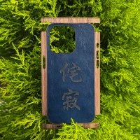 Custom cover engraving on a Toast iPhone leather and wood combo cover.