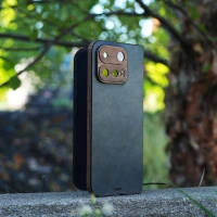 Google Pixel 11 Pro Fold with Toast leather and wood combo cover, pictured with stout black leather and walnut combination.
