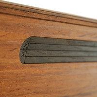 Pen charging are on Surface Pro 12 nicely detailed in ebony wood.