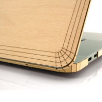 MacBook 16 Touch bar in maple, corner detail.