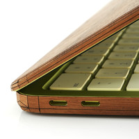 Detail shot of the corner of the all wood Toast cover for MacBook Neo.