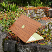 Coolest cover ever for MacBook Neo, shown in teak real wood.