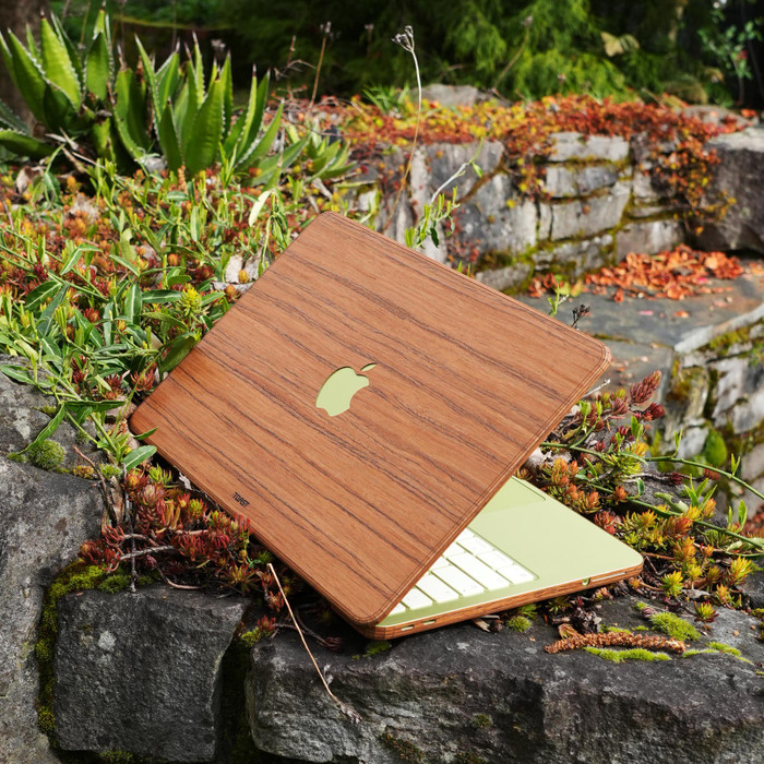 Coolest cover ever for MacBook Neo, shown in teak real wood.