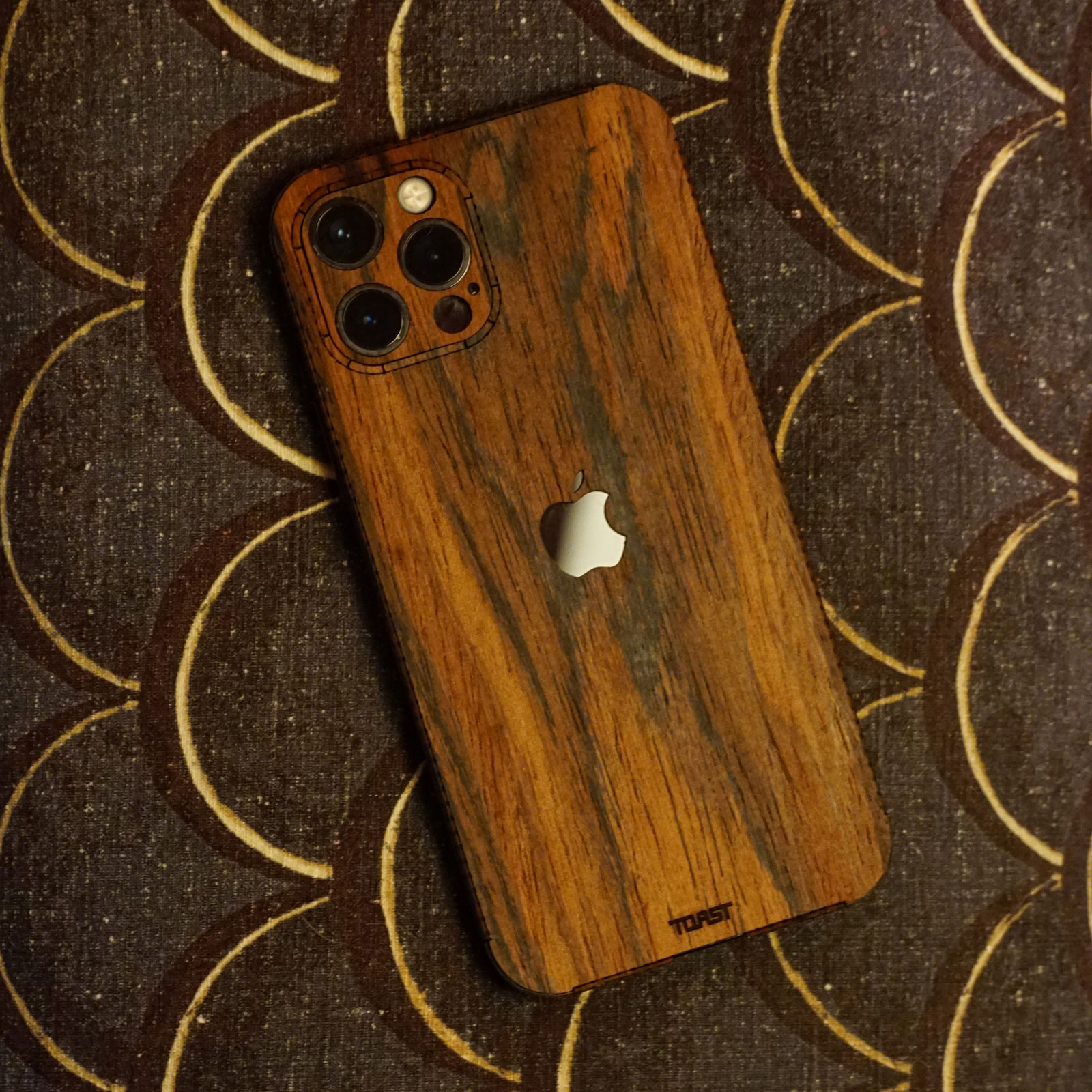 iPhone 12 Pro wood cover in rosewood by Toast