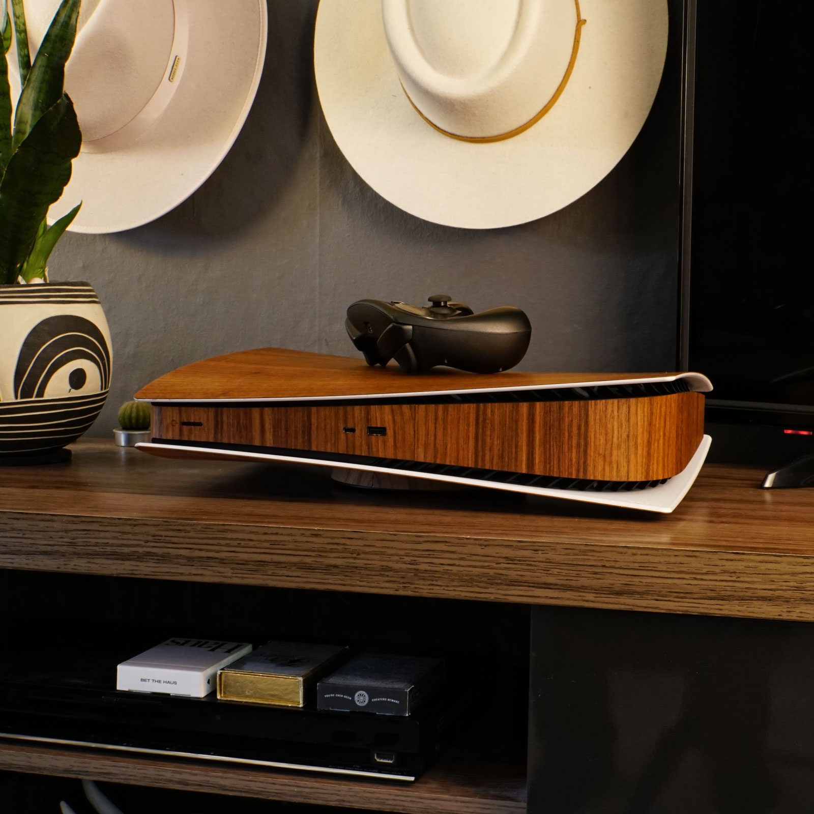 Playstation 5 wrapped in Toast rosewood wood cover.