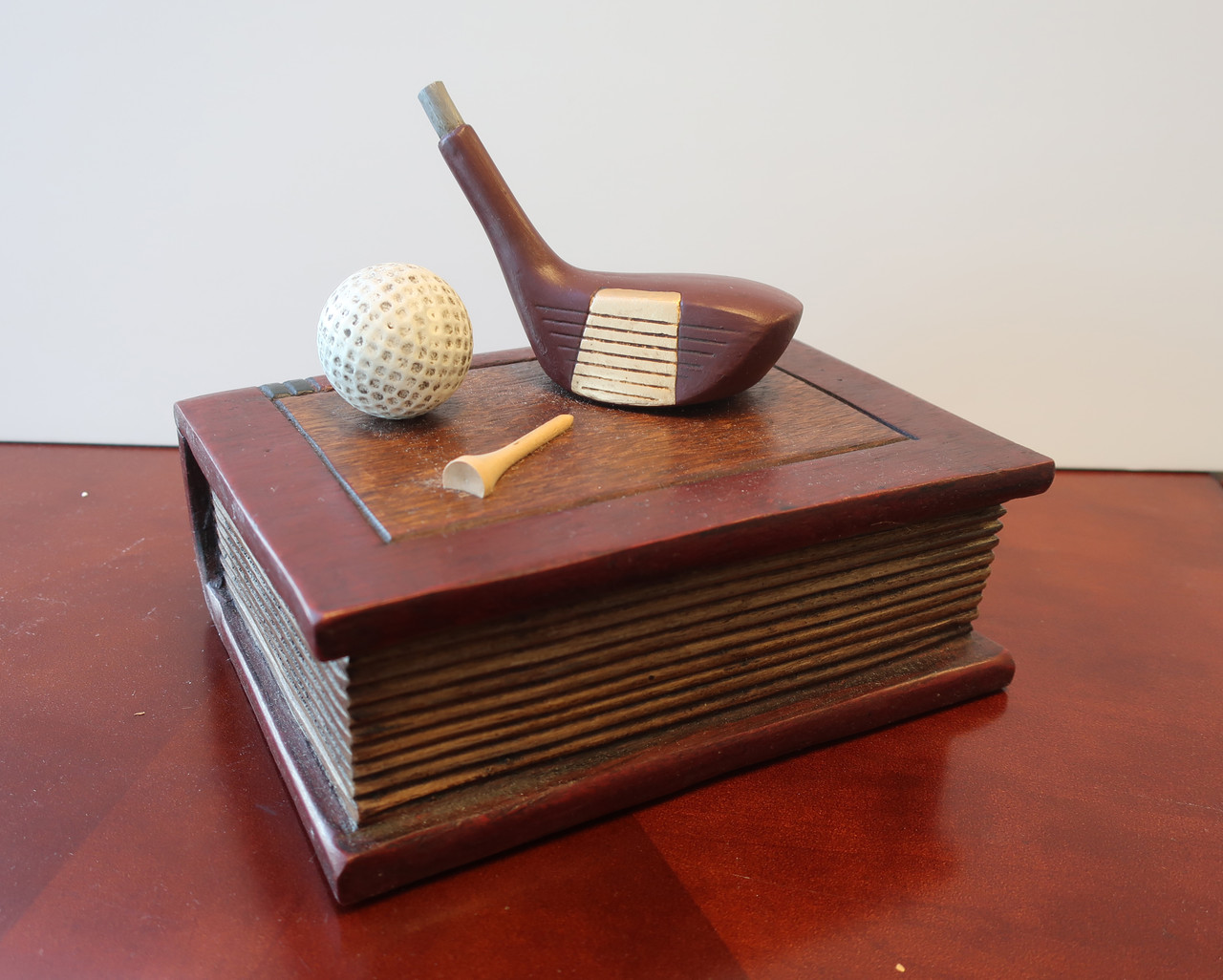 Navika Stacked Books and Driver Club Carved Wood Paper Weight 